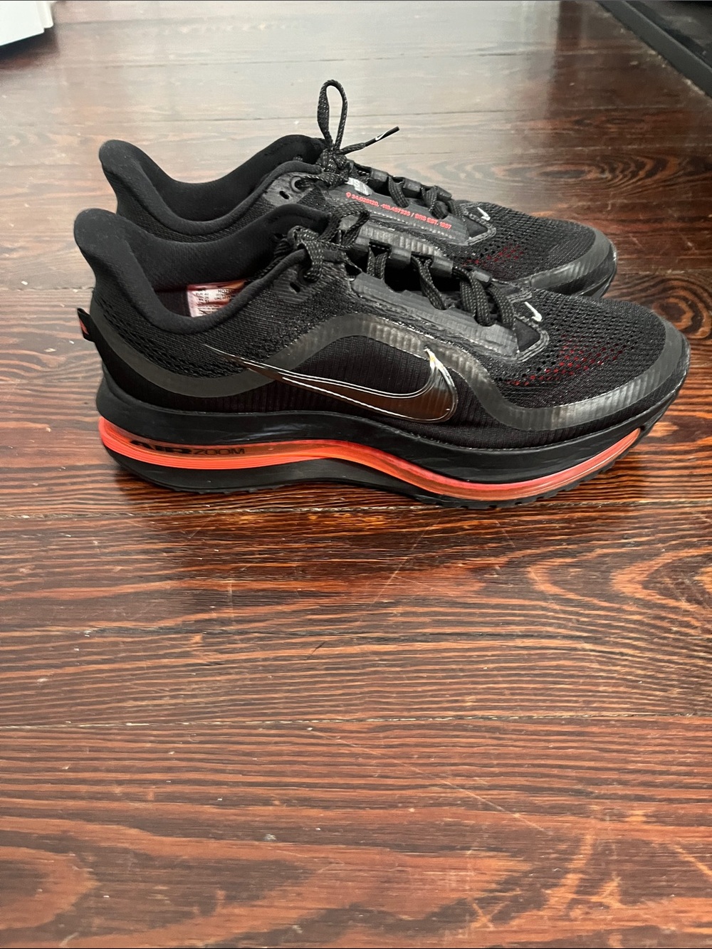 Nike Black Running Shoes with Red Accent Stripe—NIKE MEN RUN 10